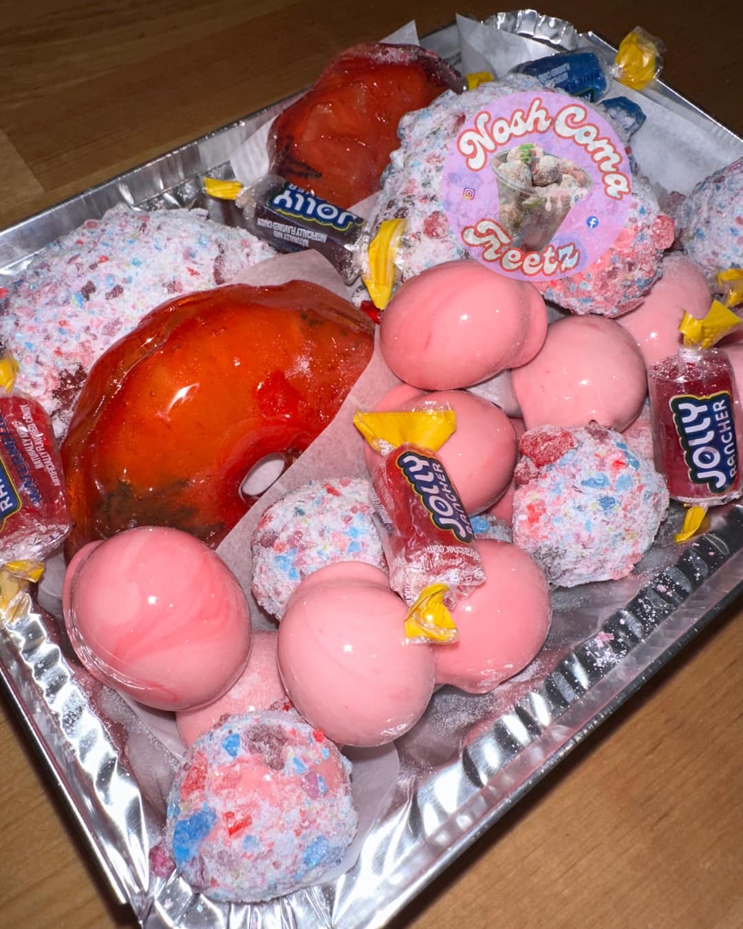 Red candied fruit platter with candy toppings